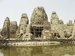 Rock cut temple with sculptures