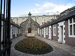 Penny's Almshouses including chapel and screen wall