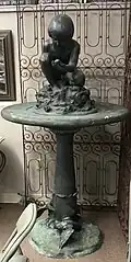 Bashka Paeff sculpted this bronze sculpture and pedestal.