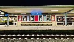 Place name sign on a platform