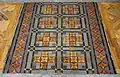 Tiling with plain and Encaustic tiles arranged in geometric patterns, surrounded by parquet floor, the Chapel, Liverpool Royal infirmary