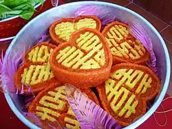 Xôi with gac fruits